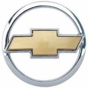 EMBLEMA (GRAVATA) CELTA/PRISMA 07/13 DOURADO E CROMADO (PORTA MALAS)